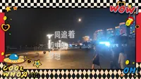 （记录生活86）夜晚漫步烟台滨海广场，温柔海风缓缓扑面而来，咸湿气息漫过肩头。一轮明月静静悬在夜空，清辉洒落海面。海浪低声呢喃，城市灯火错落。