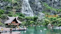 在浙江安吉天荒坪余村，有这么一处神仙地方。躲进余村矿坑里的瀑布咖啡，灰岩壁垂着白练似的飞瀑，脚边是浸着凉意的翡翠色湖面，风裹着咖啡香扫过茅草亭，是一种享受。