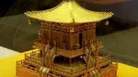 唐代铜浮屠，法门寺博物馆藏。陕西法门寺地宫发现，鎏金，分塔基、塔身、塔刹三部分，楼阁式塔国内仅见。禁止出国展览的