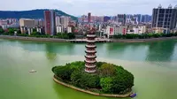 通天塔位于韶关市区洲心岛之上，始建于 1546年，毀于1854年兵乱，曾为岭南曲江二十四景之一。时隔160年，再次矗立在洲心岛之上，重现了古时岭南胜景“中流塔影