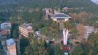航拍四川平昌县佛头山森林公园内，有一纪念馆，碑名题写人是他
